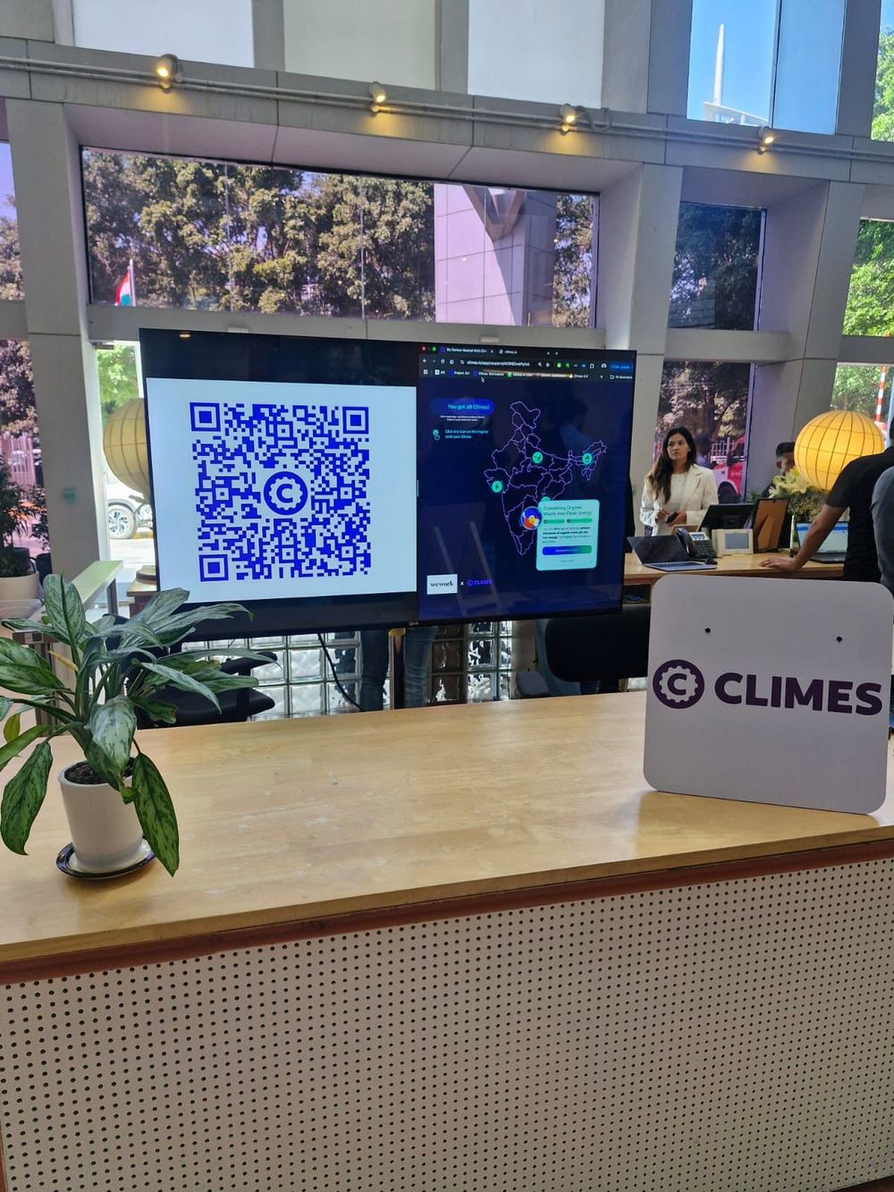WeWork x Climes carbon-neutral summit floor screen